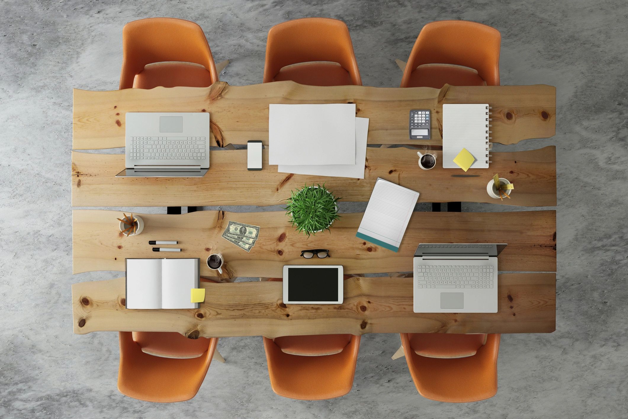 Organised office desk with laptop and documents