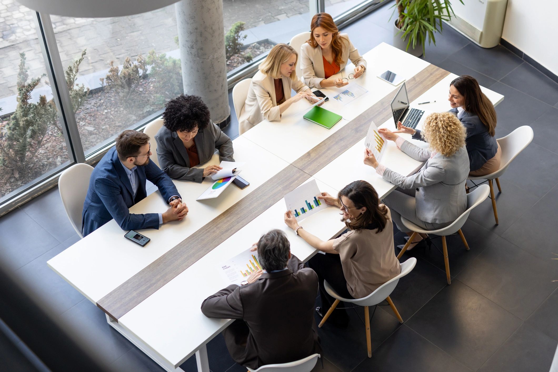 Professionals collaborating in a modern office meeting